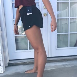 Black Nike running shorts